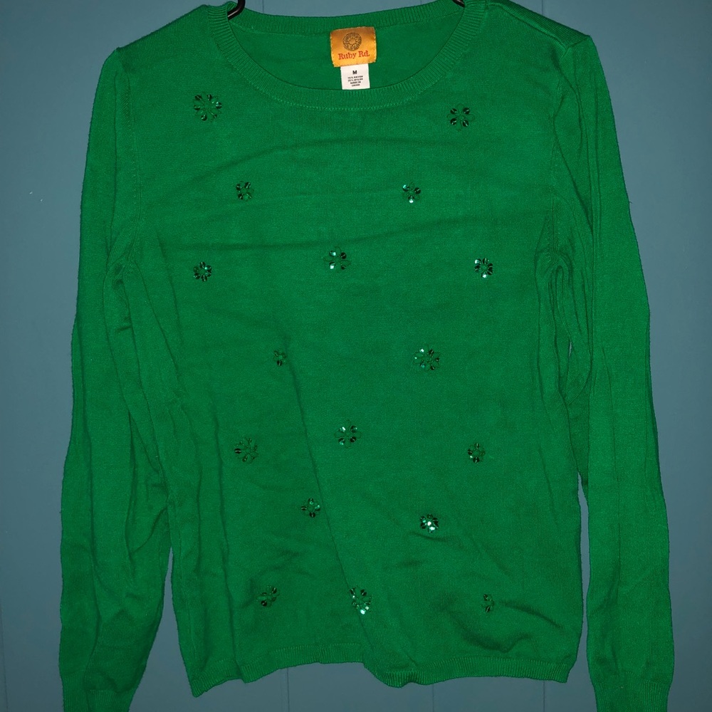 Green sweater with sparkles